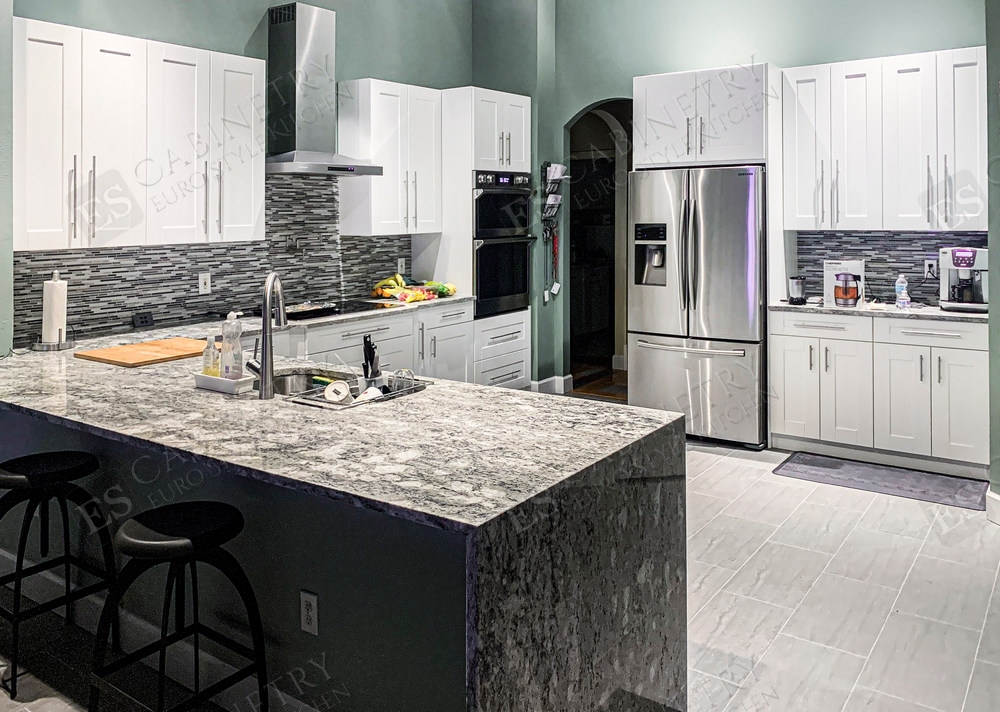 white shaker style cabinets mixed with gray ceramic